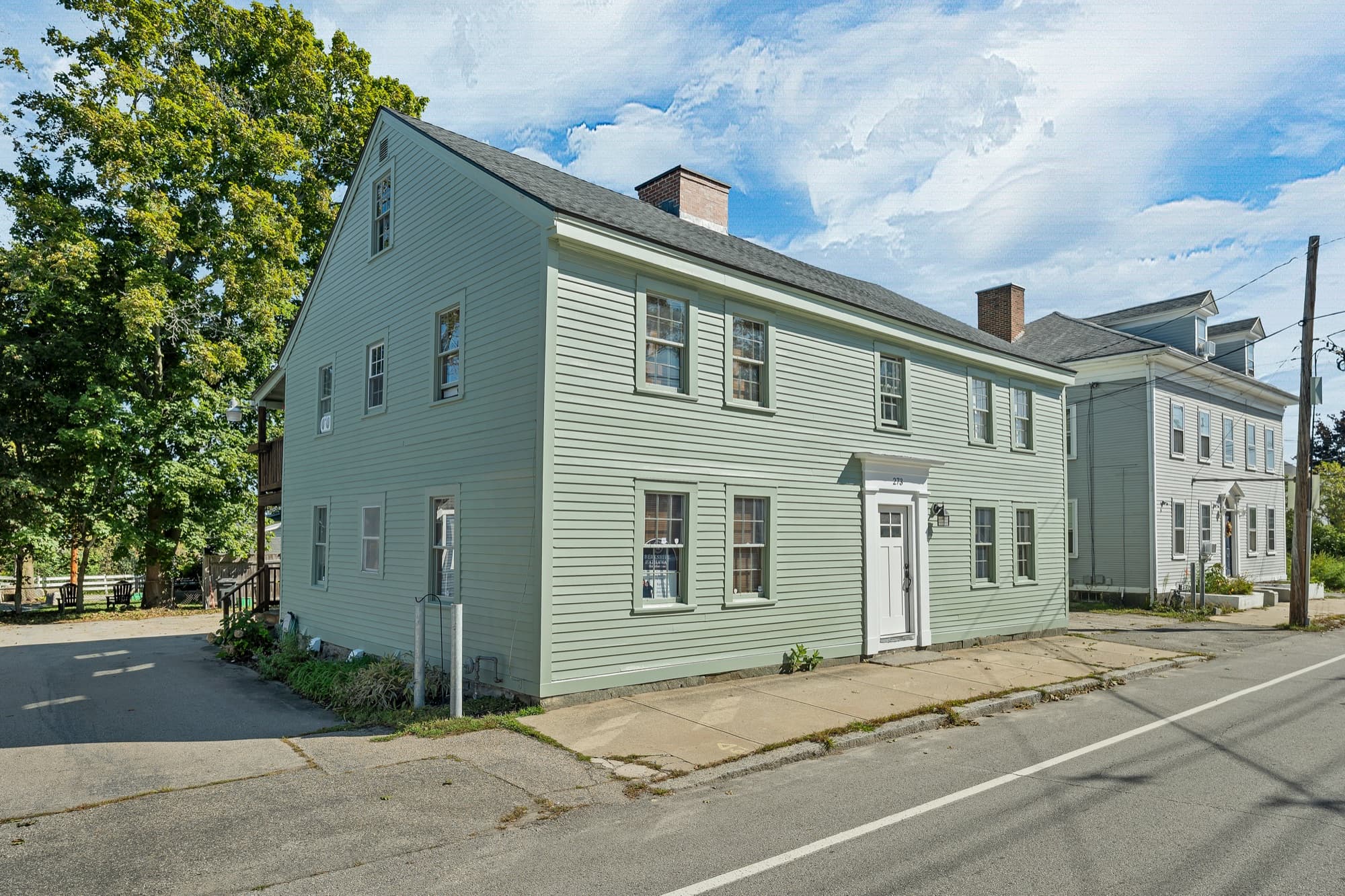 Corner view of the newly painted building along Maplewood Avenue
