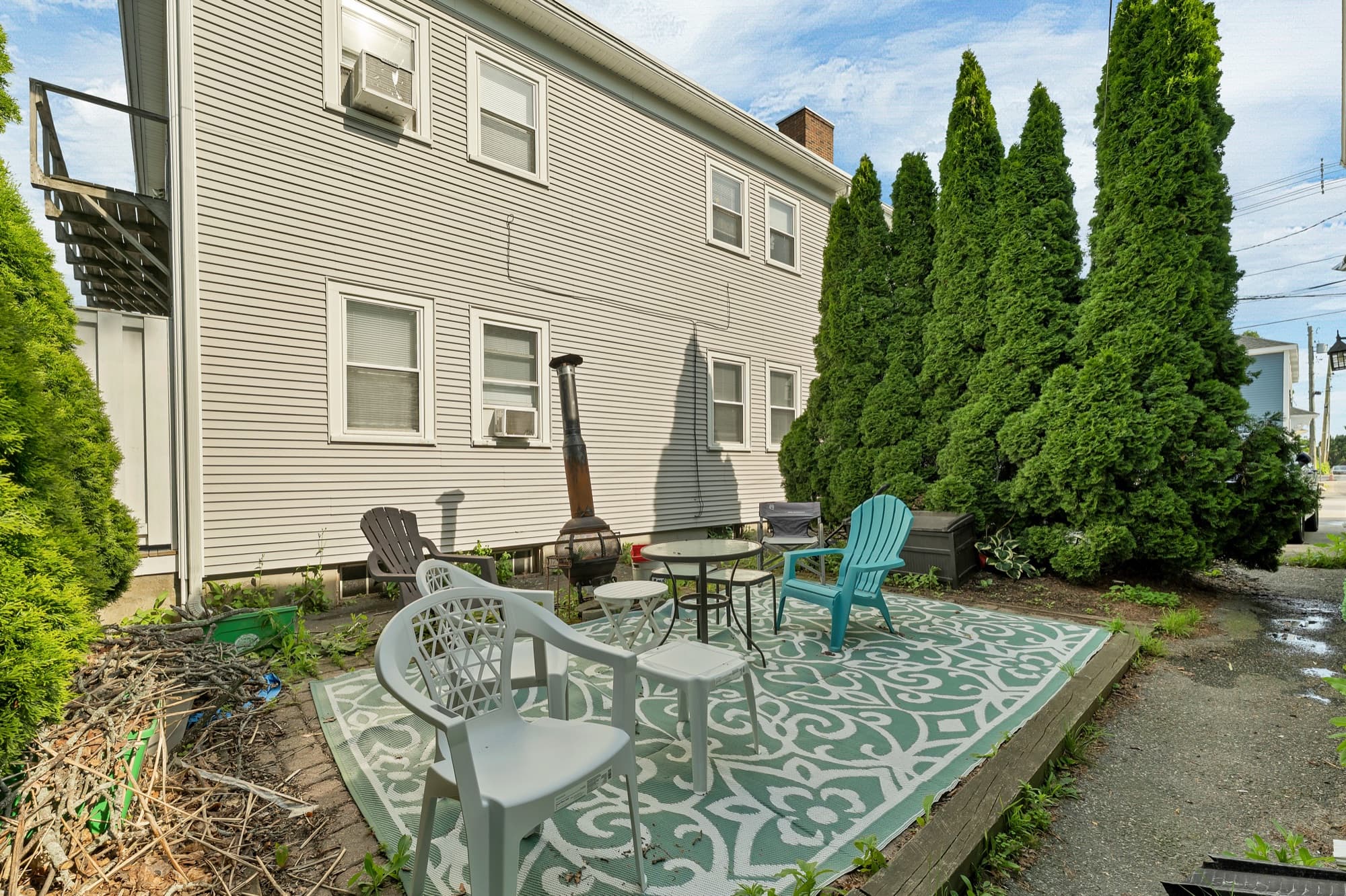 Shared backyard patio with seating